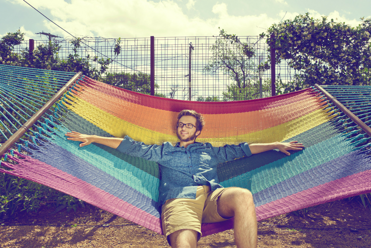 A photo of queer Texan and Latino Josh Inocencio at Axelrad Beer Garden in Houston