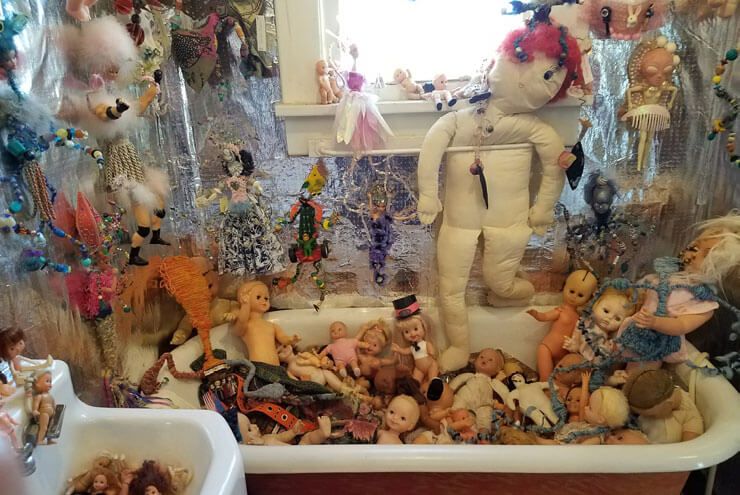A photo of dolls at the Grassroots Art Center in Lucas, Kansas, as seen on the Tex-Kan Artist Residency.