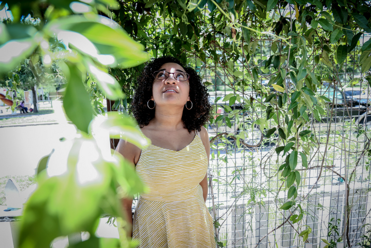 A photo of Sasha Lamprea, queer brown woman in grad school