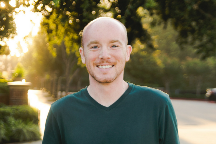 A photo of Russell Etherton sharing his story about his first HIV test.