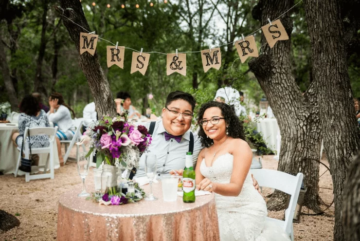 A photo of Sasha Lamprea and Natalie Arrevalo's queer southern wedding.
