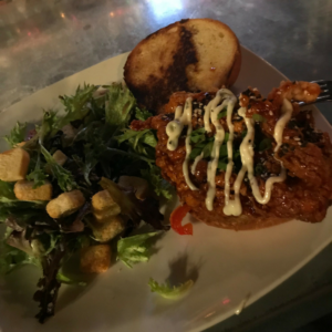 A photo of the Korean fried chicken sandwich at The Village Idiot in Kentucky.