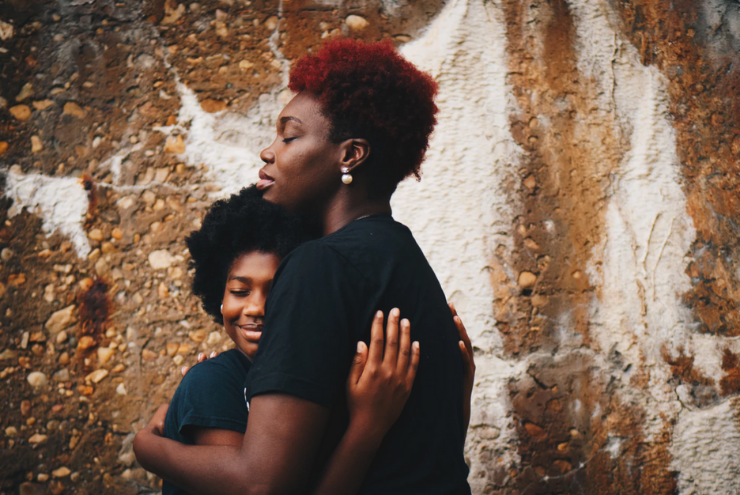 A photo of talking to your child about queerness.