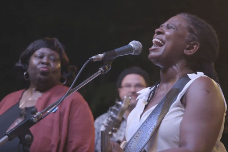 A photo of Invisible, playing at a Houston church.