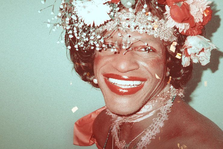 A photo of trans woman Marsha P. Johnson.