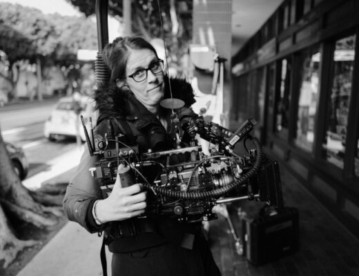 A photo of filmmaker Bianca Cline filming Marcel the Shell.
