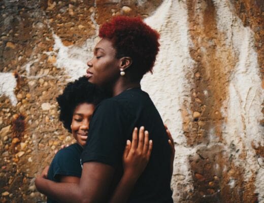 A photo of talking to your child about queerness.